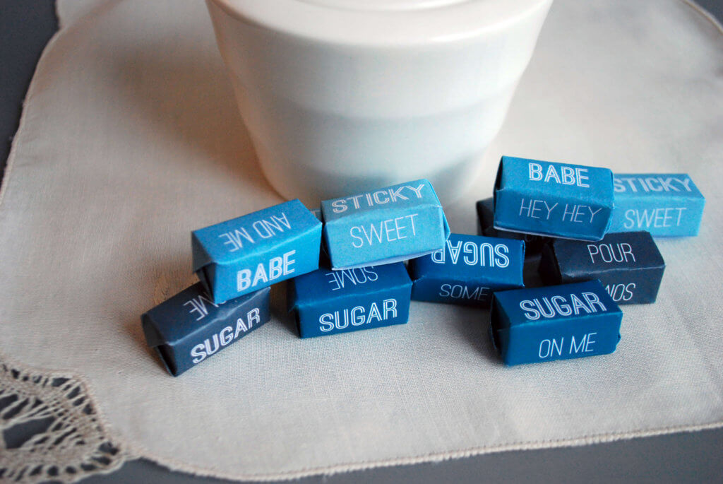 Make individually wrapped sugar cubes with Pour Some Sugar On Me lyrics (with video on how to fold sugar cube wrappers)