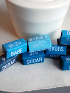 Make individually wrapped sugar cubes with Pour Some Sugar On Me lyrics (with video on how to fold sugar cube wrappers)