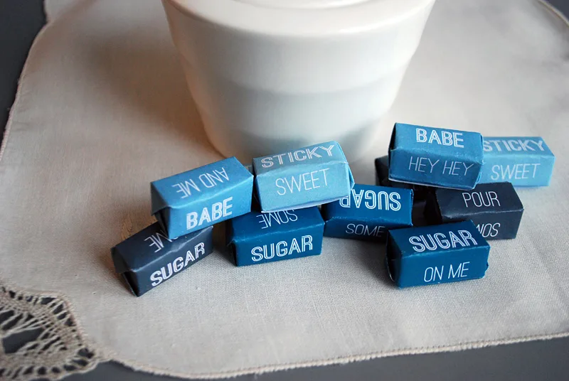 Make DIY individually-wrapped sugar cubes with 'Pour Some Sugar On Me' lyrics. It's easy! Type to personalize, print, then watch the video on how to fold personalized sugar cube wrappers. Makes a cute DIY gift!