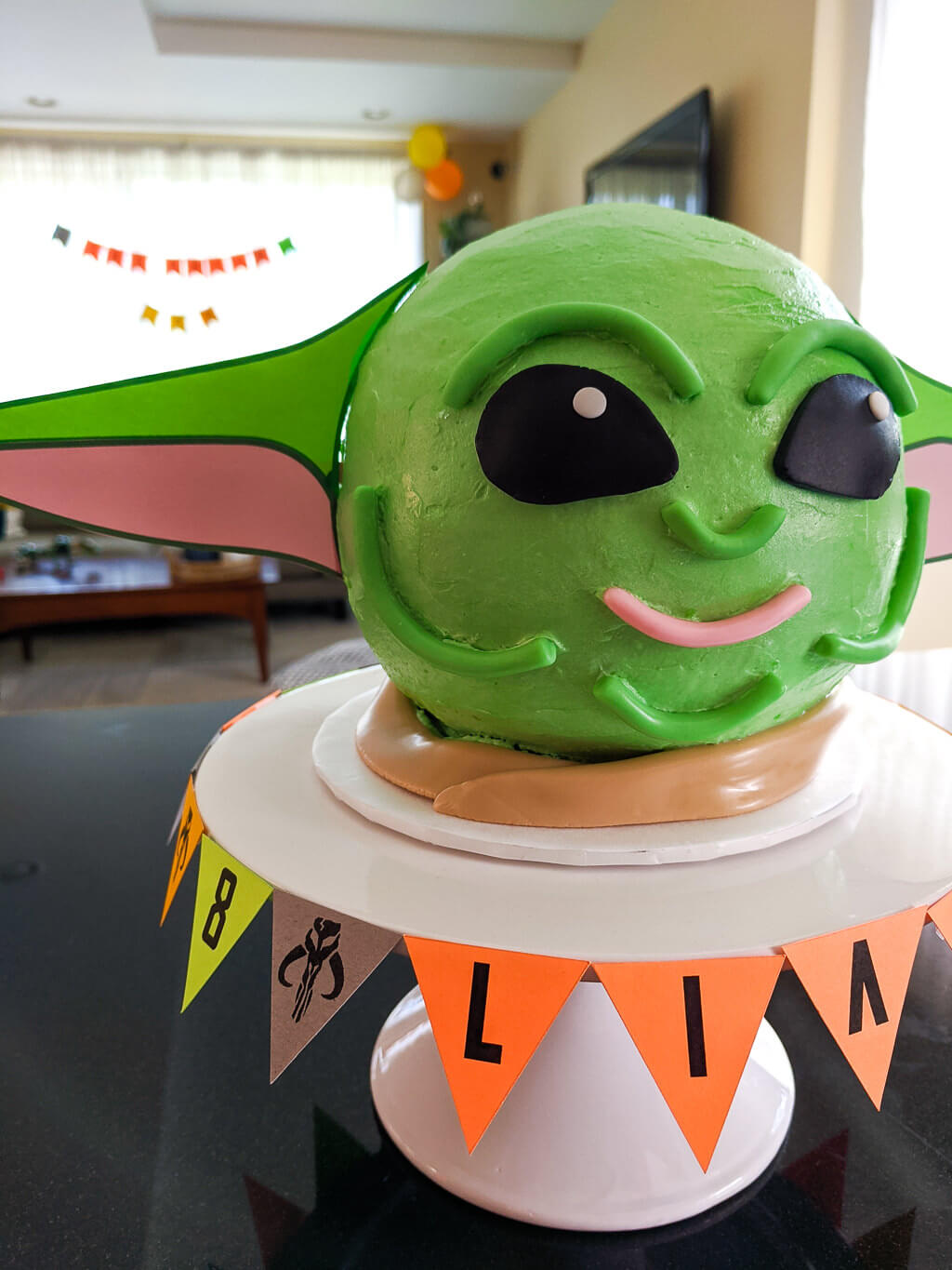 DIY Baby Yoda cake on a cake stand