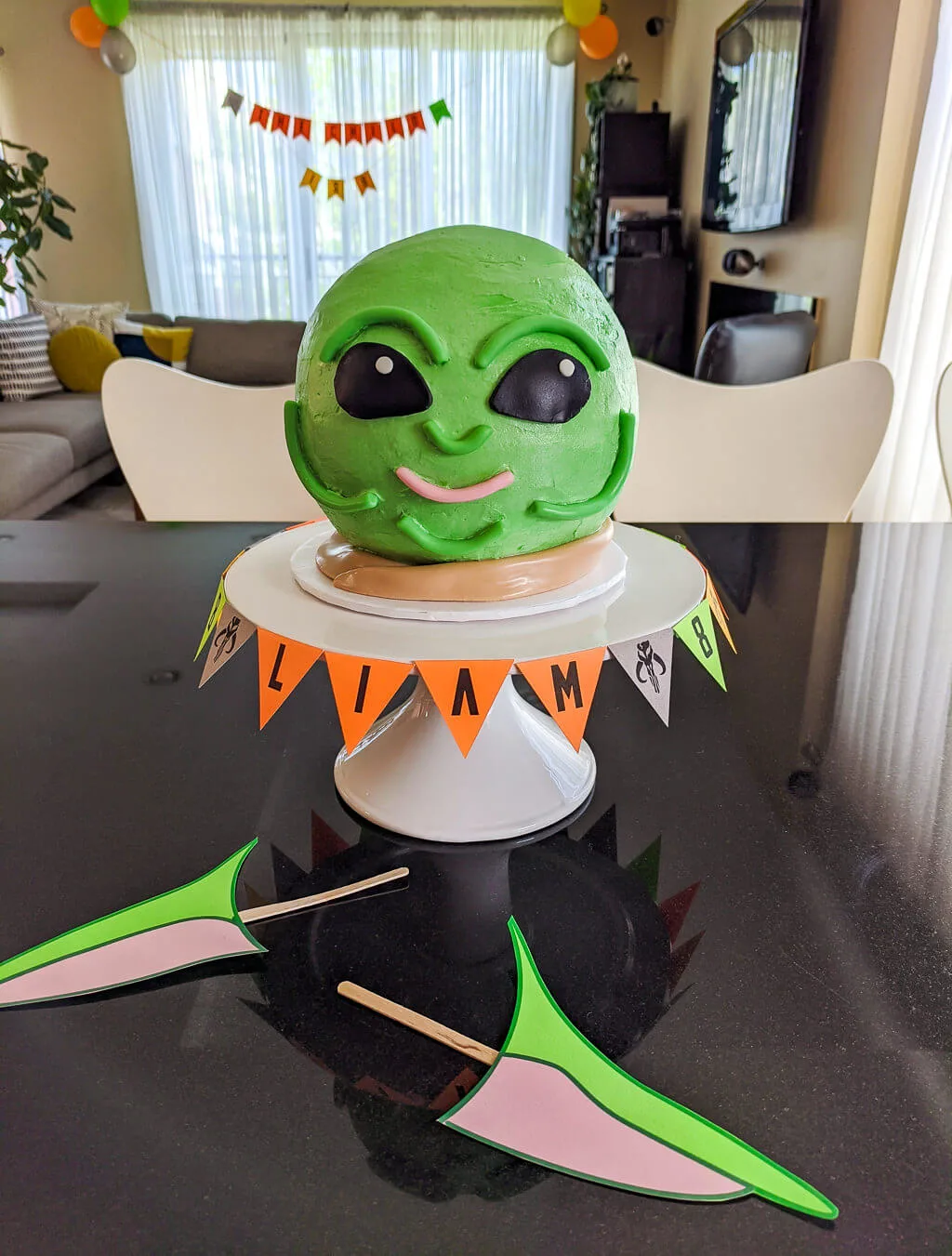 How to make an easy Mandalorian Baby Yoda head cake with printable cake topper ears DIY Baby Yoda cake with printable cake topper ears