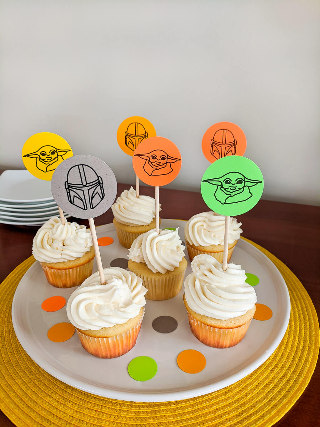 Mandalorian cupcakes with Baby Yoda The Child and Mandalorian helmet cupcake toppers