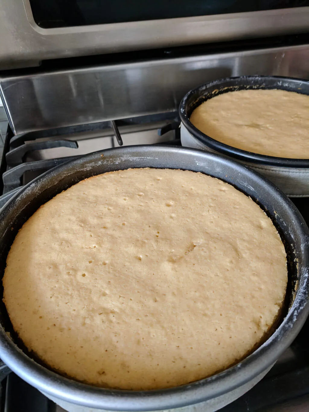 9 inch round cakes cooling in pans