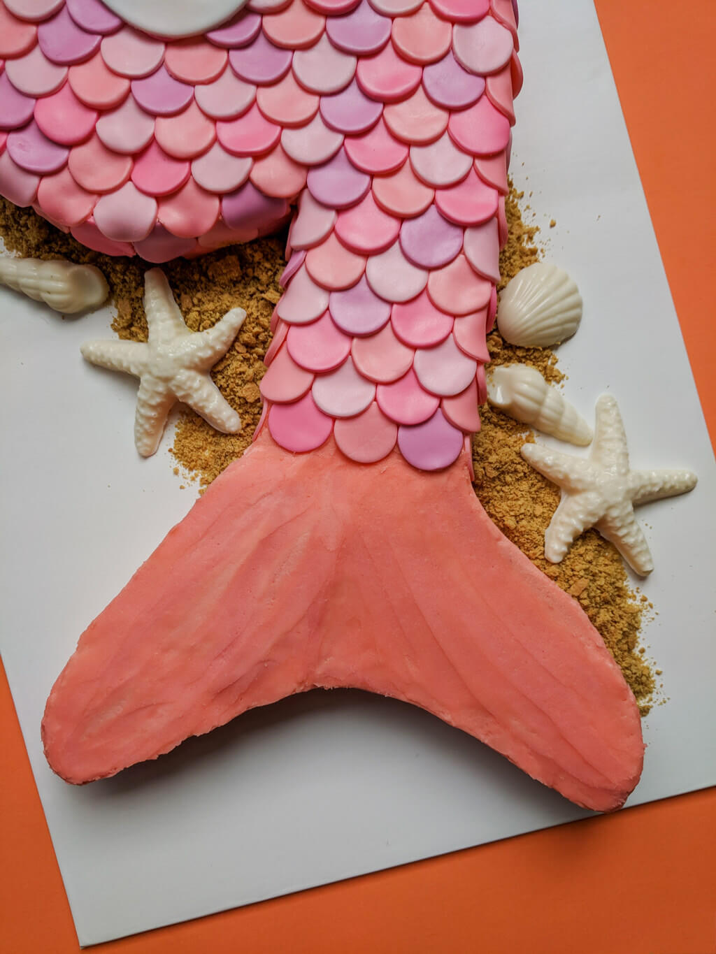 Mermaid cake with tail and chocolate shells
