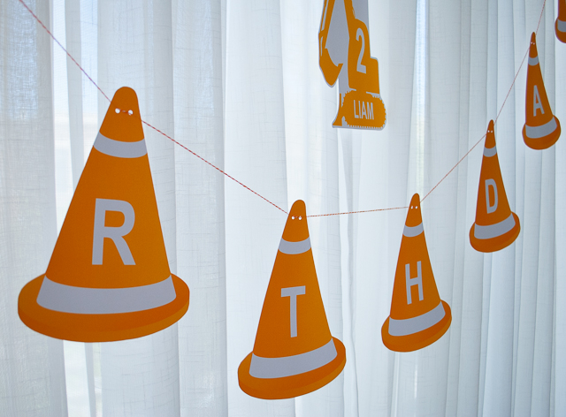Printable construction cone happy birthday banner for a modern construction birthday party. Just type to personalize, print, cut and hang!