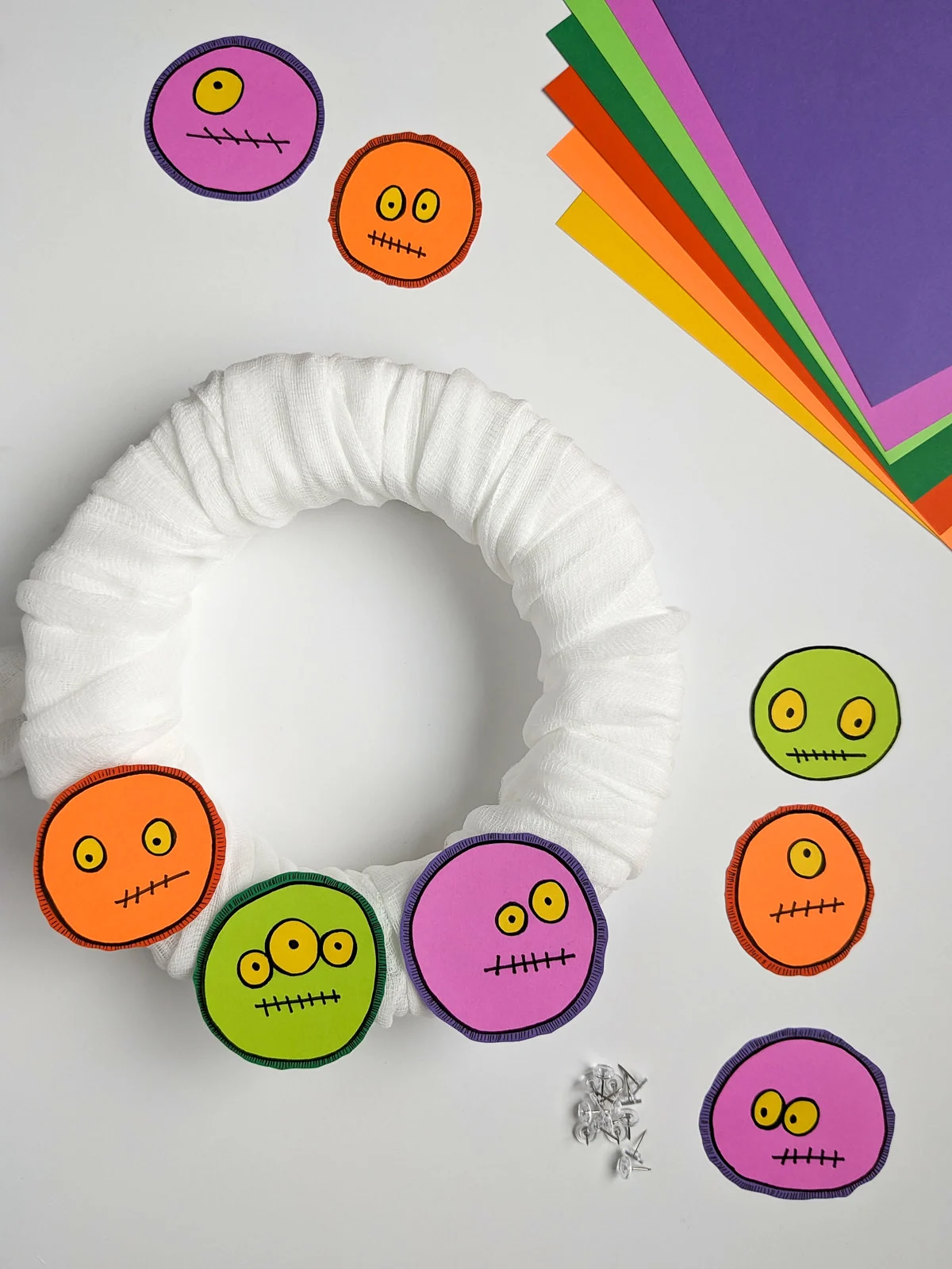 How to make a Halloween monster wreath | DIY Halloween Decorations Adding monsters to a DIY Halloween wreath covered in cheesecloth rather than tulle