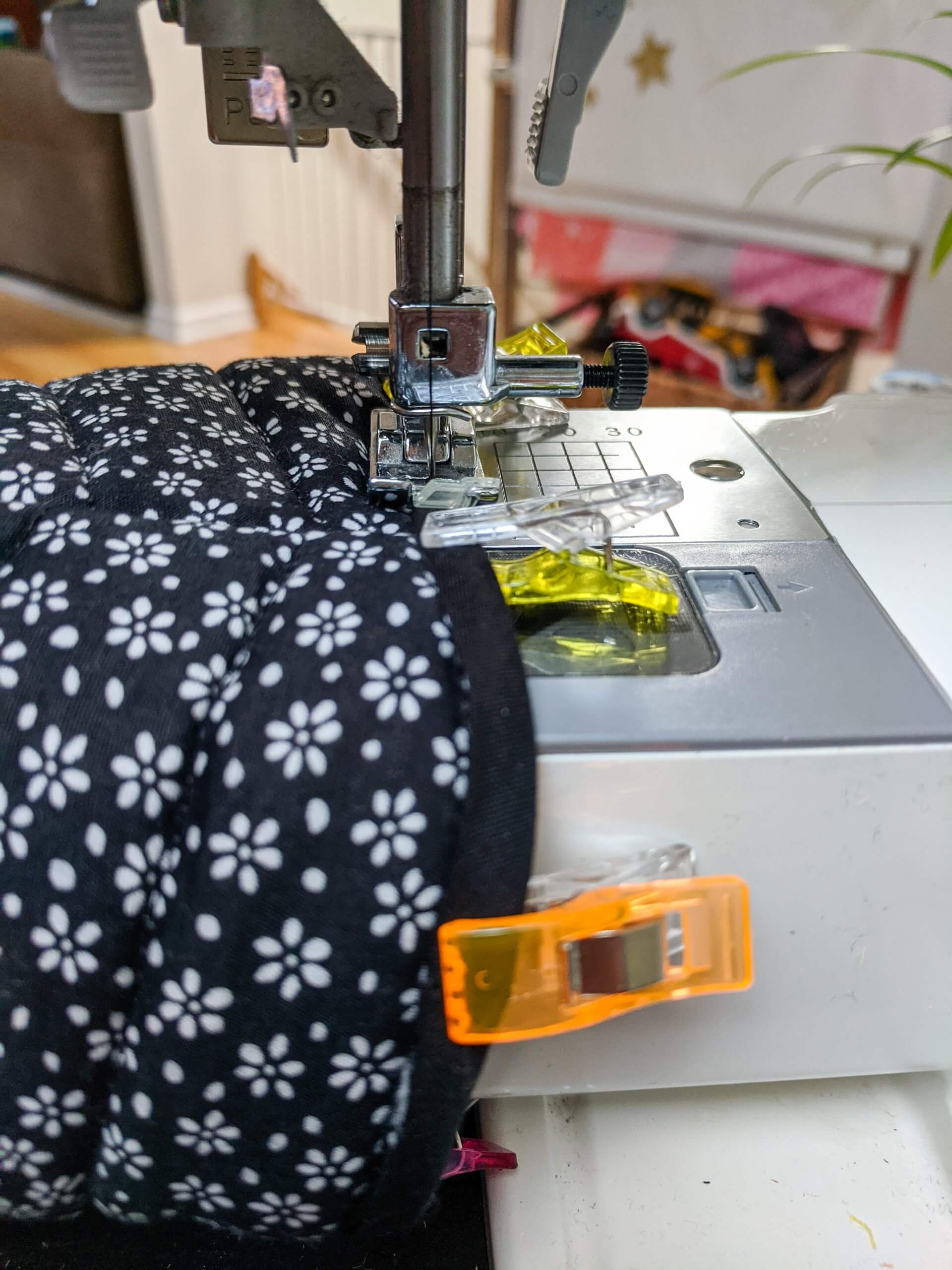 Sewing bias tape onto the bottom of oven mitts tutorial