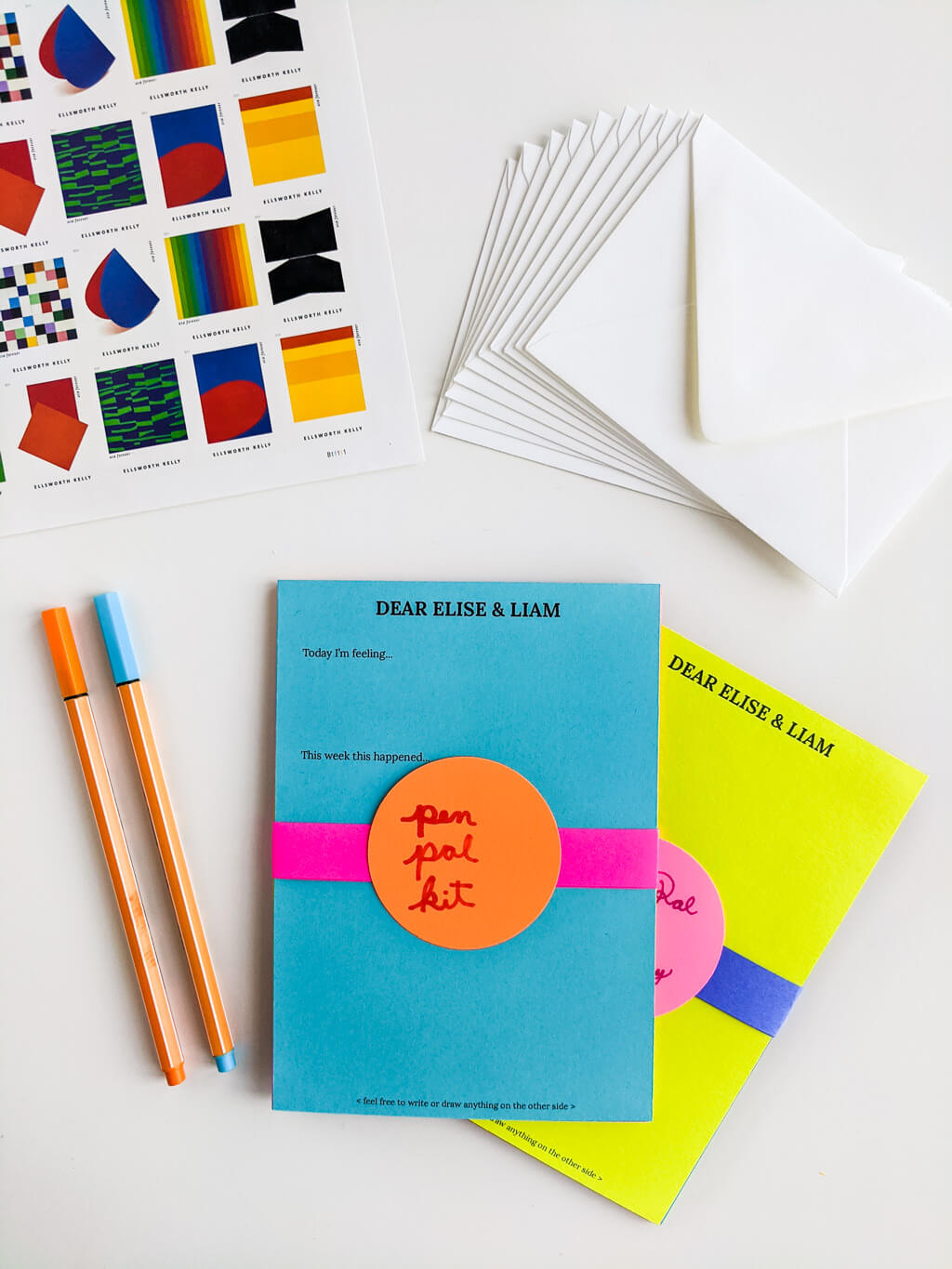DIY Pen Pal Kit with letters, envelopes, stamps, and markers