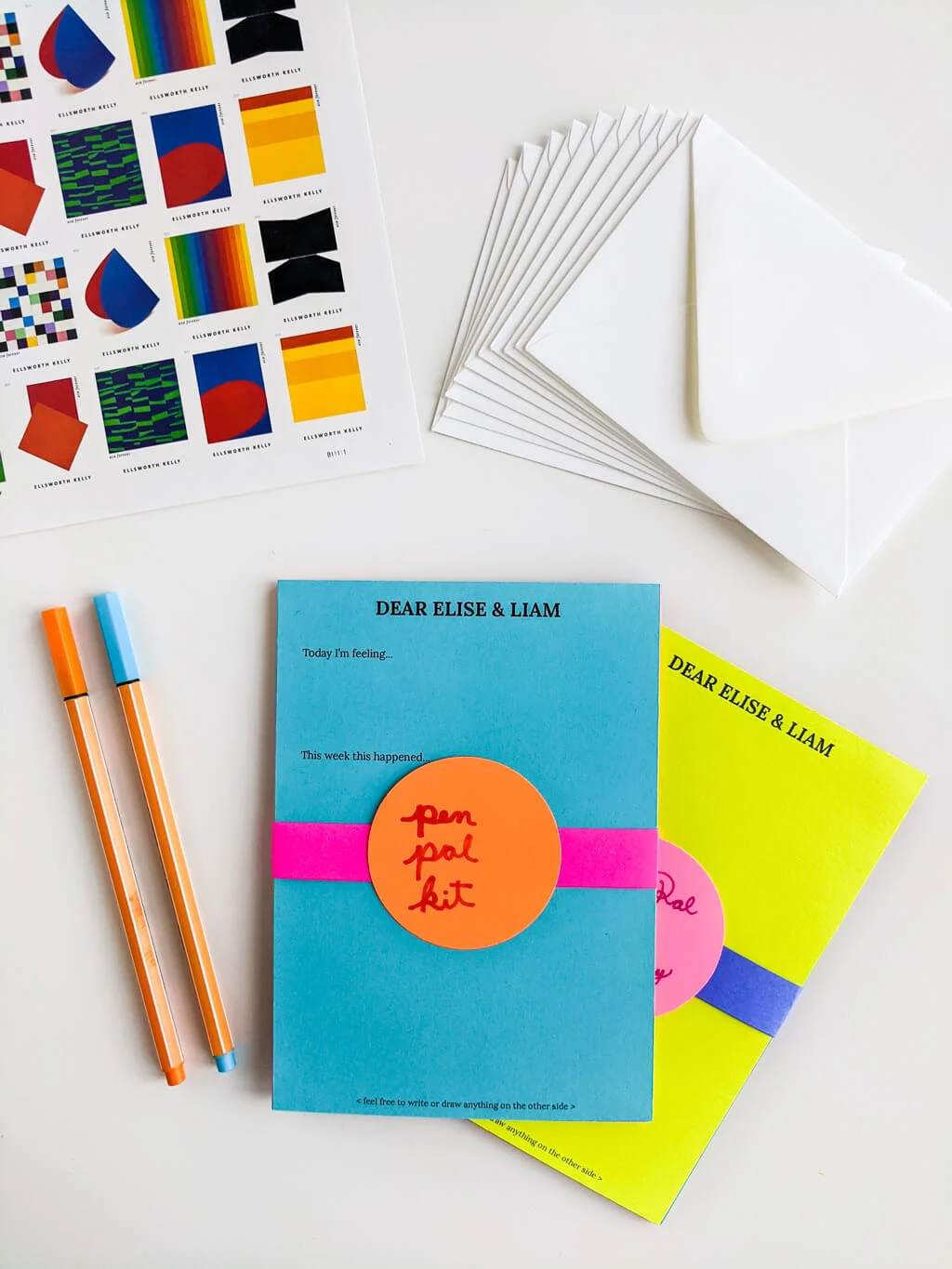 DIY Pen Pal Kit with letters, envelopes, stamps, and markers