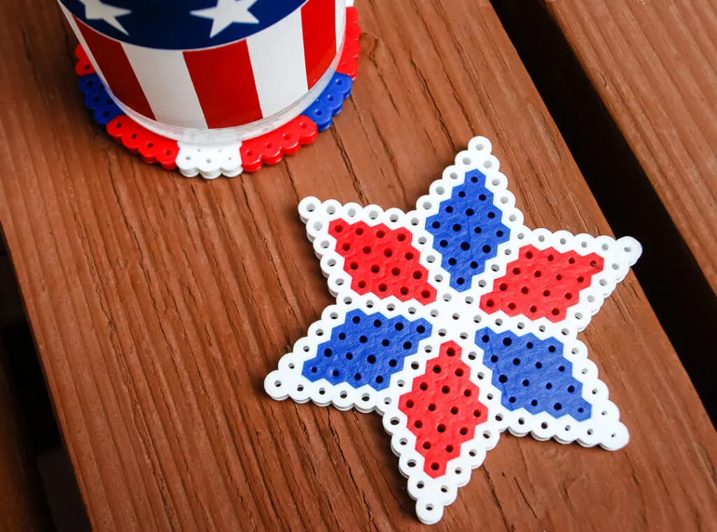 Easy DIY perler bead red, white and blue star drink coasters for Fourth of July. Makes a fun and useful kid's summer craft activity!