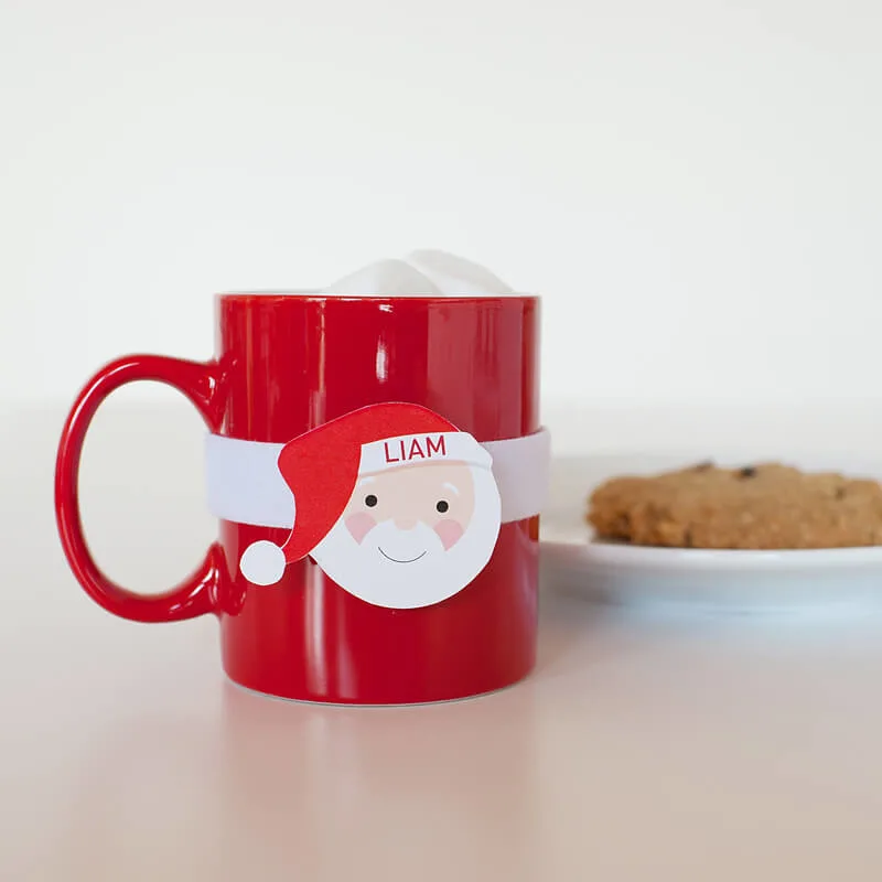 Personalized DIY holiday mugs - make one for each family member, just wrap and then unwrap to wash
