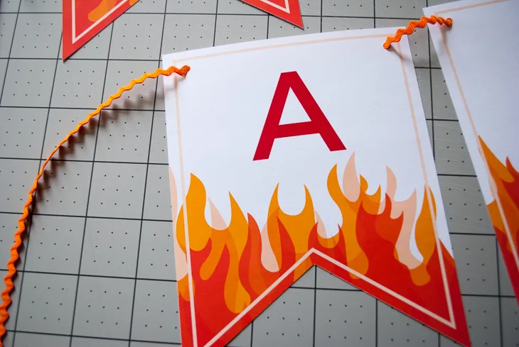 Super cute printable Fire and Flames personalized happy birthday banner for a modern fireman birthday party (or Planes Fire & Rescue inspired birthday party). Just download, type to personalize, print and cut!