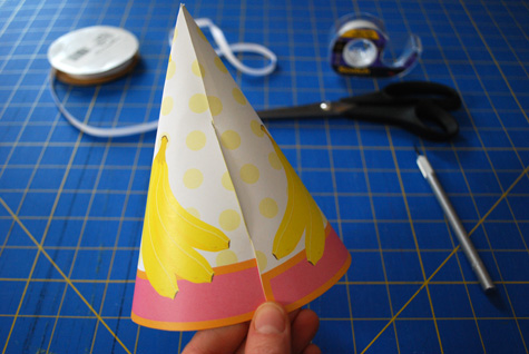 Pink monkey printable birthday party hat for kids free craft project tutorial by Kathy Beymer at Merriment Design