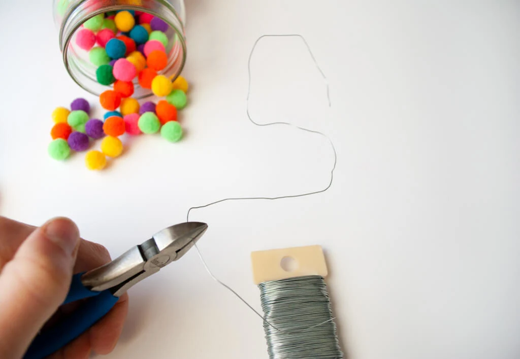 How to curve wire into letters when making pom pom crafts