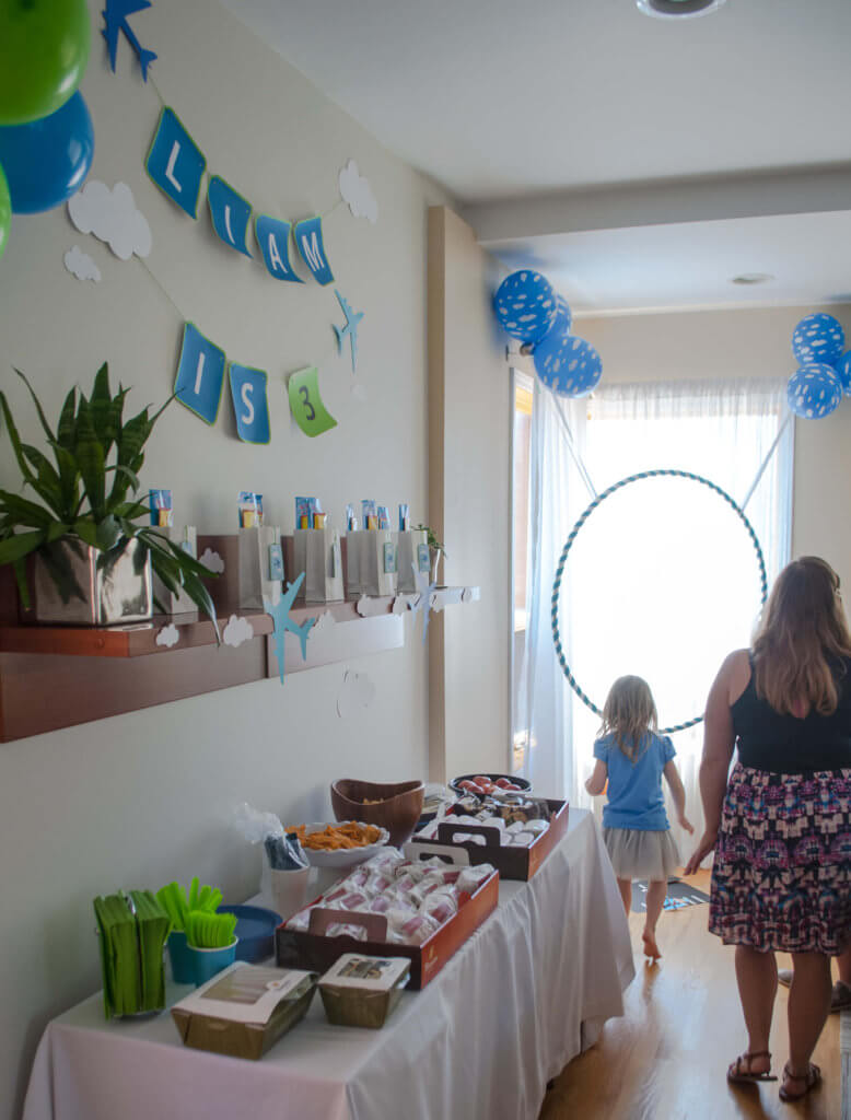 DIY Airplane birthday party decorations, airplane banner, and airplane party game