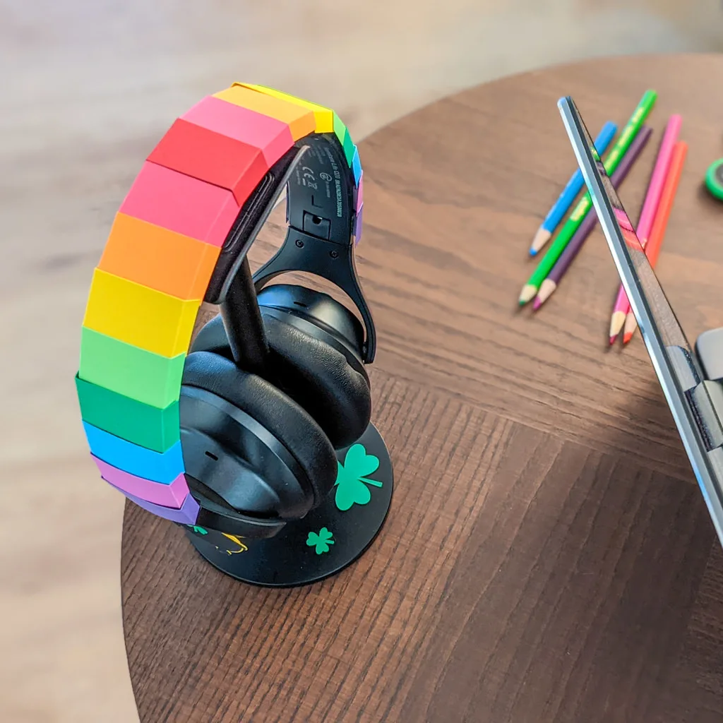 Headphones decorated with paper rainbows