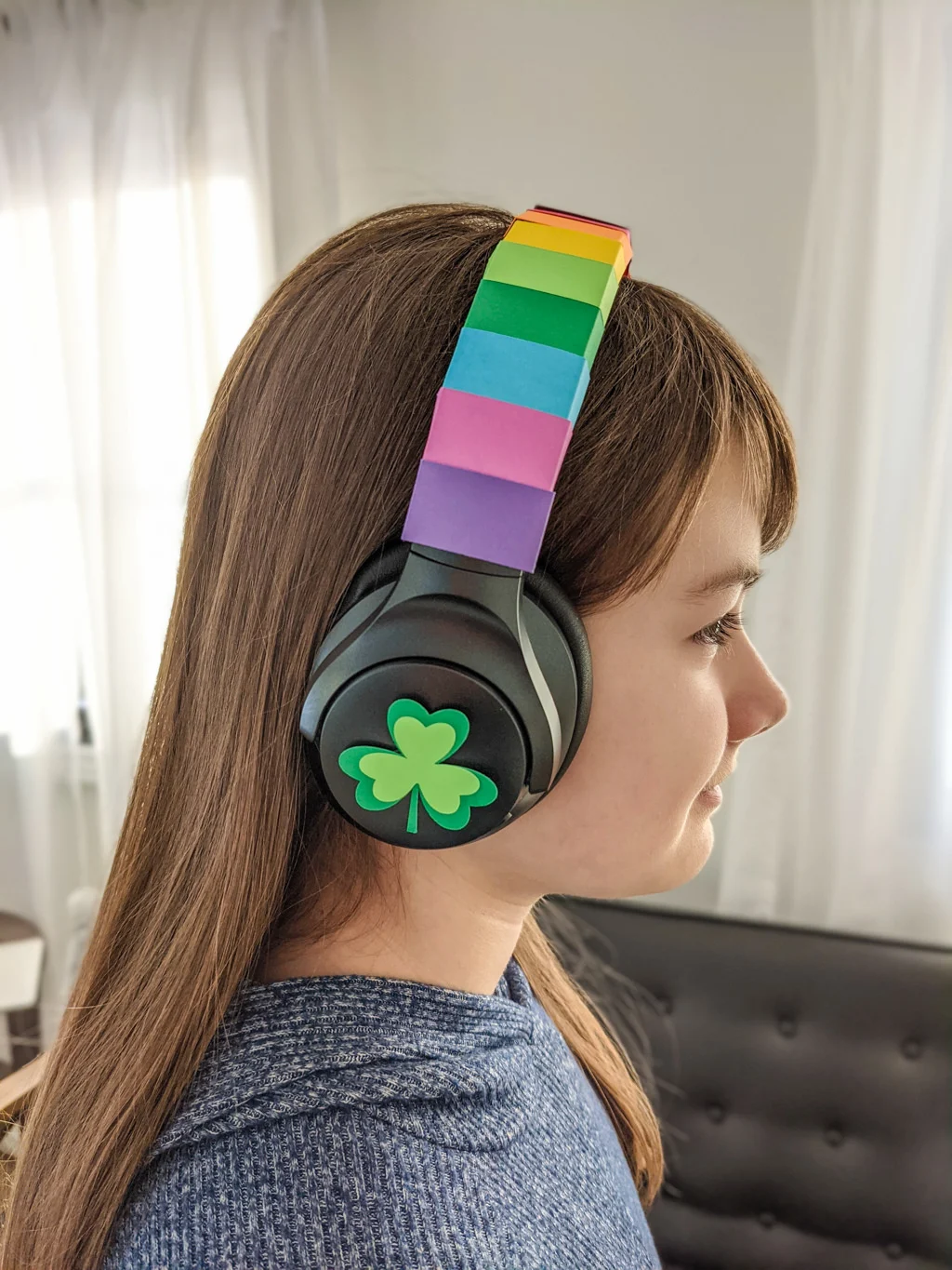 Elise wearing DIY rainbow headphones for St. Patrick's Day