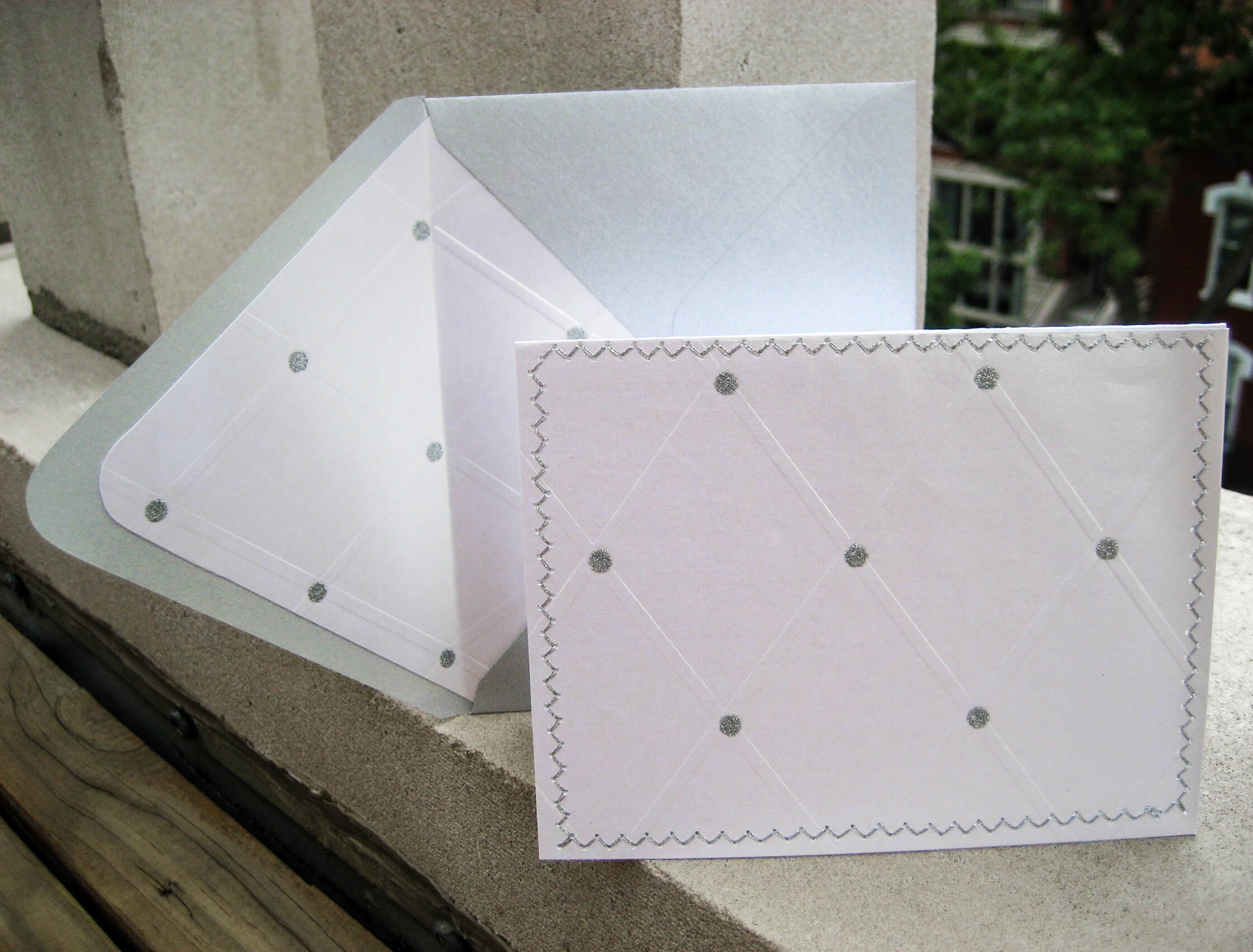 Recycled wrapping paper sewn wedding card