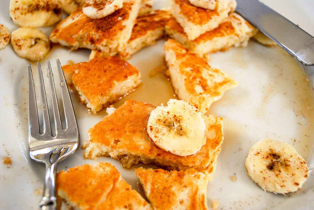 Rice pancakes cut up on a plate