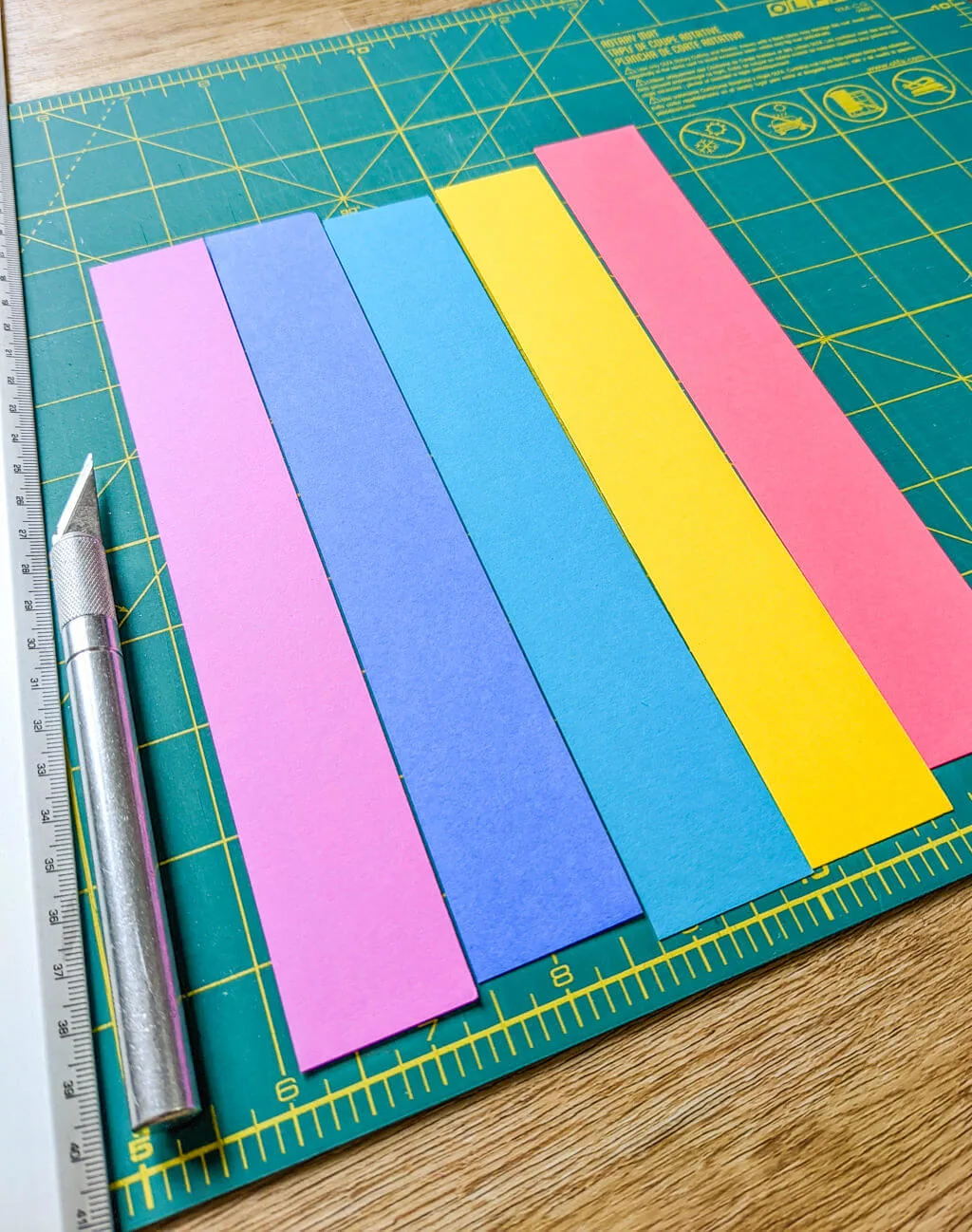 Strips of colored paper for making a paper rainbow card