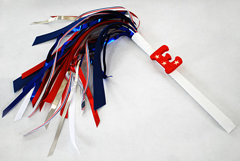 Merriment :: Sparkless sparklers for kids for the Fourth of July using chopsticks, ribbon and party garland free DIY tutorial craft project for Merriment Design by Kathy Beymer at MerrimentDesign.com