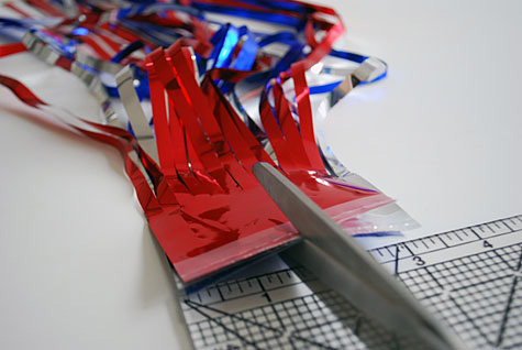 Merriment :: Sparkless sparklers for kids for the Fourth of July using chopsticks, ribbon and party garland free DIY tutorial craft project for Merriment Design by Kathy Beymer at MerrimentDesign.com