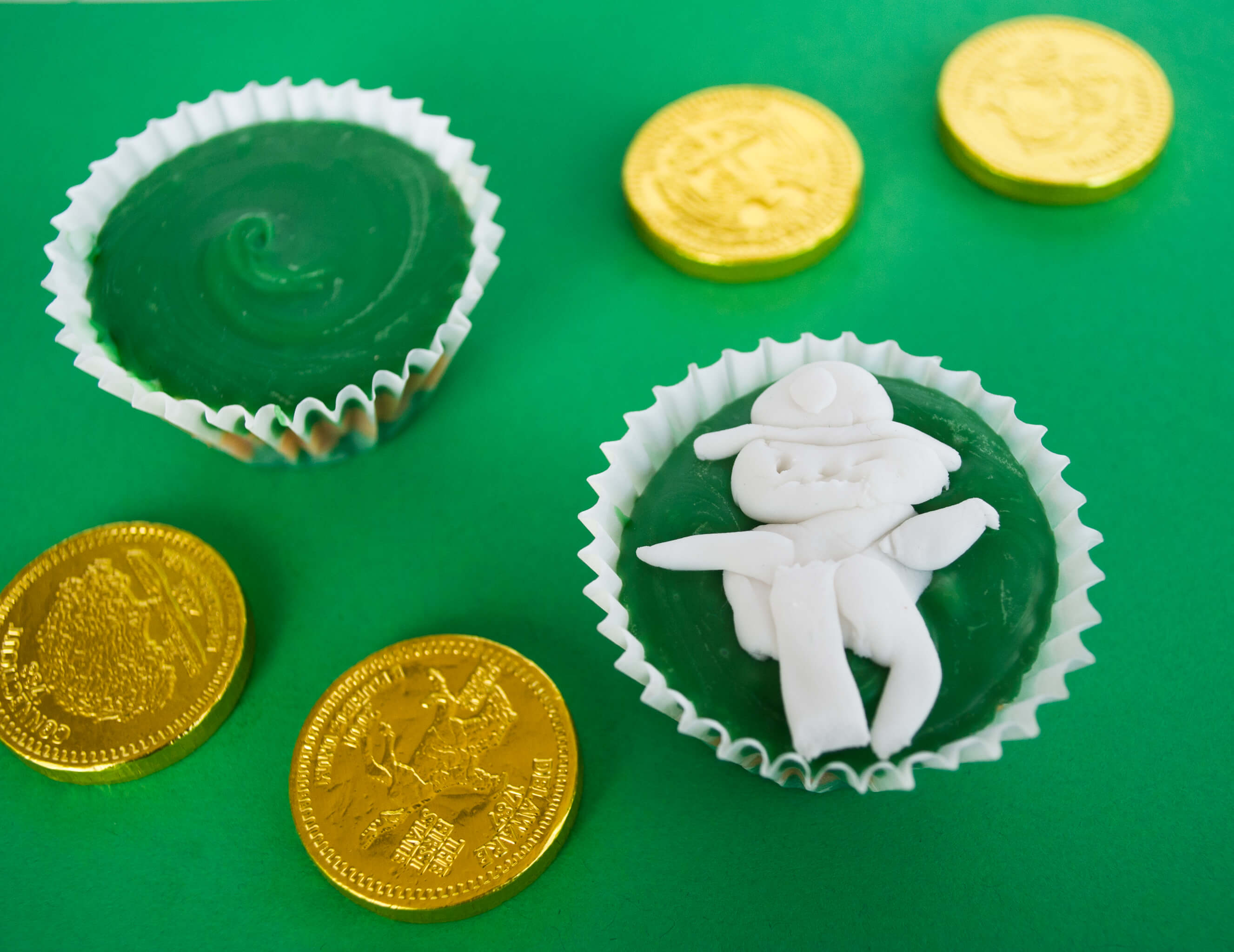 St. Patrick's Day Chocolate Peanut Butter Cups Recipe. Make these lucky green chocolate peanut butter cups for your little leprechauns.