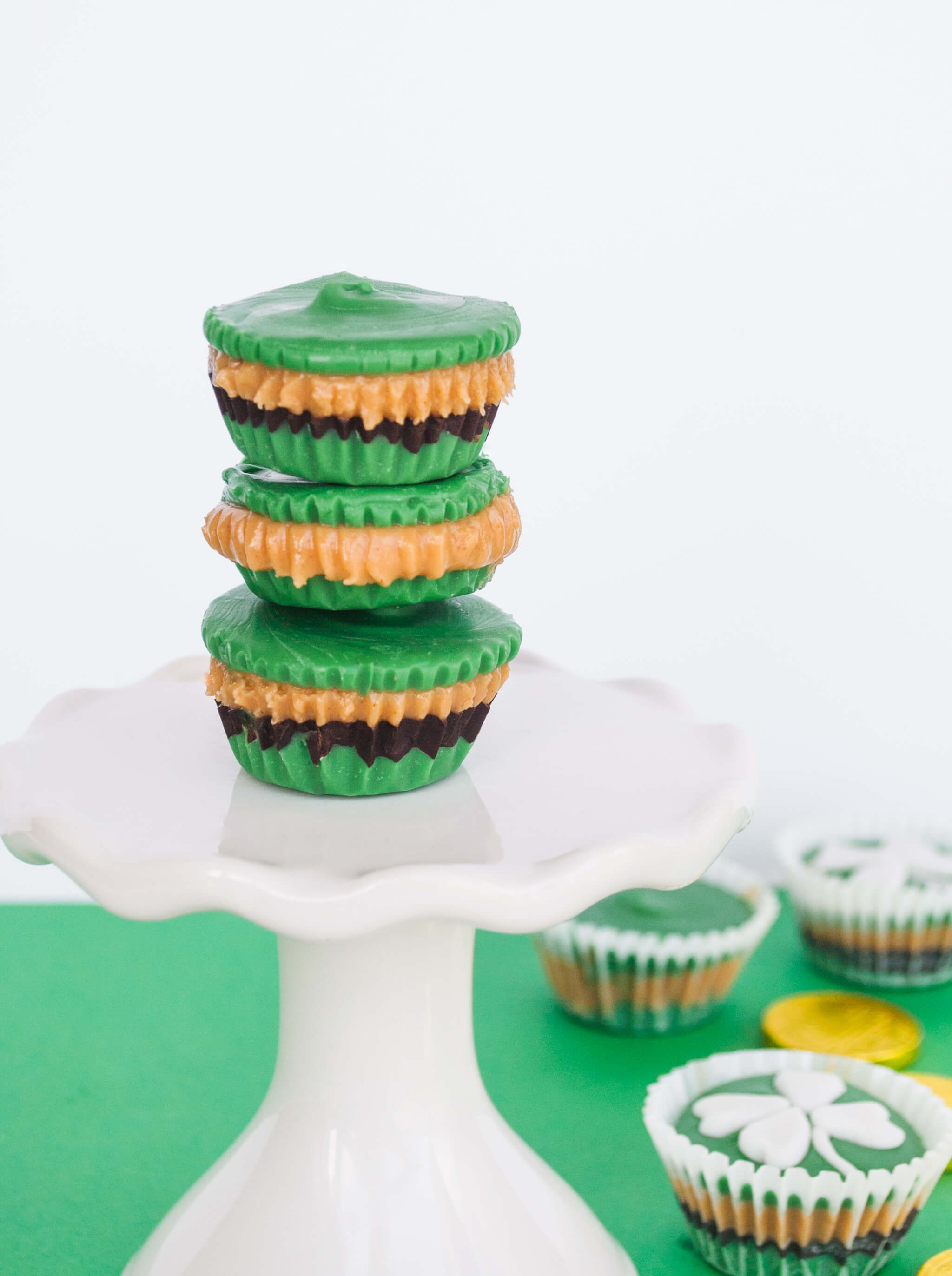 St. Patrick's Day Chocolate Peanut Butter Cups Recipe. Make these lucky green chocolate peanut butter cups for your little leprechauns - it only takes 5 ingredients and 30 minutes plus fridge cooling time.