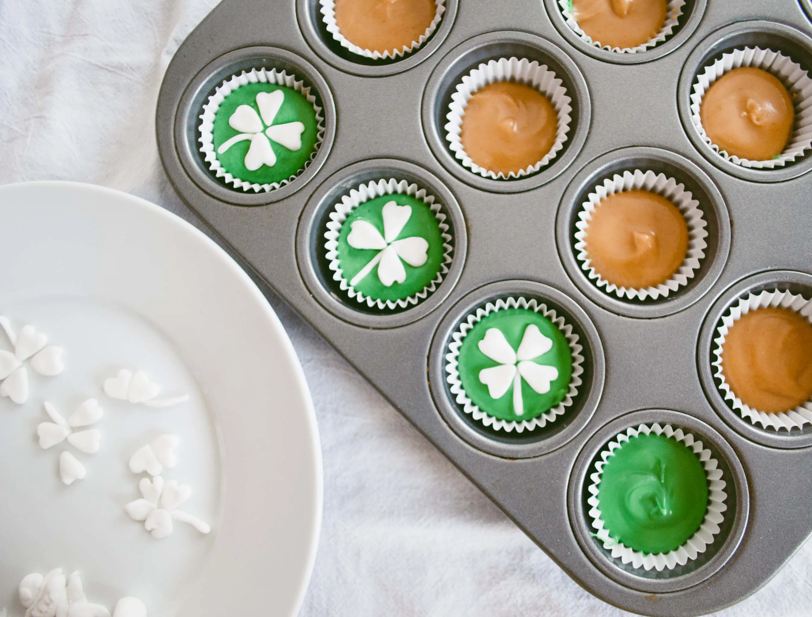 St. Patrick's Day Chocolate Peanut Butter Cups Recipe. Make these lucky green chocolate peanut butter cups for your little leprechauns - it only takes 5 ingredients and 30 minutes plus fridge cooling time.