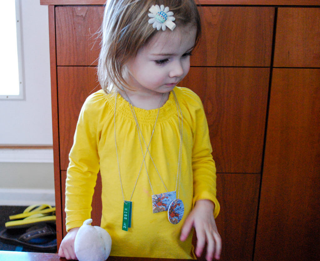 Elise wearing St. Patricks' Day DIY necklaces copyright Kathy Beymer