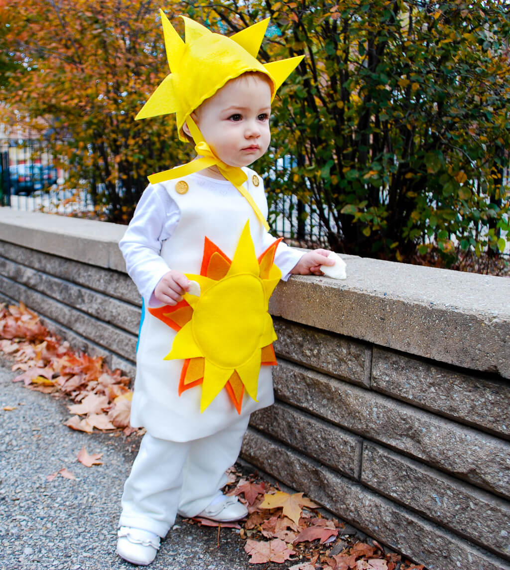 Sunshine and Rainbows DIY Halloween costume. Get this free sewing pattern to make this cute toddler and baby Halloween costume idea.