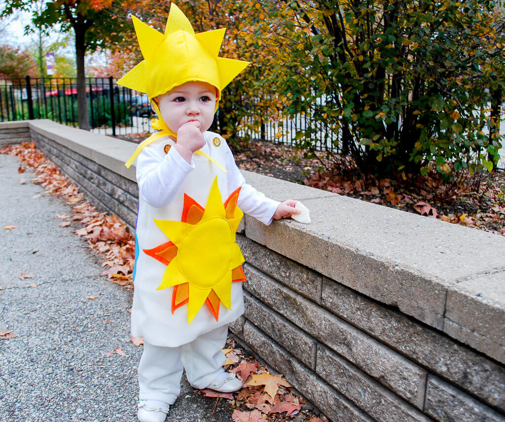 DIY Sunshine and Rainbows Halloween costume. Get this free sewing pattern to make this cute toddler and baby Halloween costume idea.