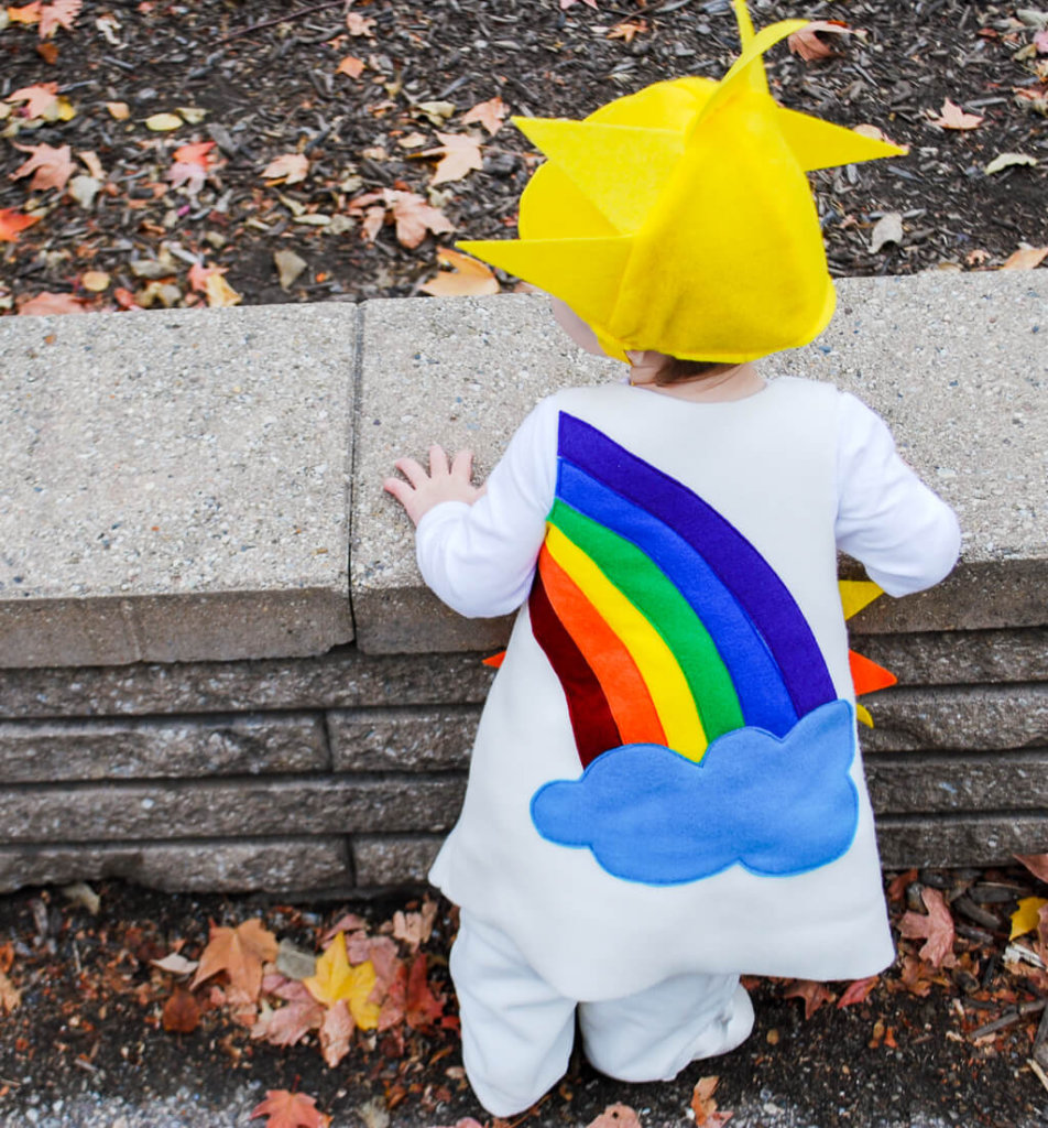 Sunshine and Rainbows DIY Halloween costume. Get this free sewing pattern to make this cute toddler and baby Halloween costume idea.