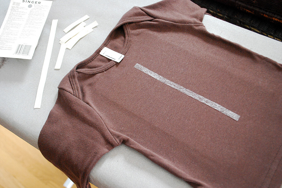 Make a DIY football t-shirt for the Super Bowl using iron-on web and grosgrain ribbon - no sewing required