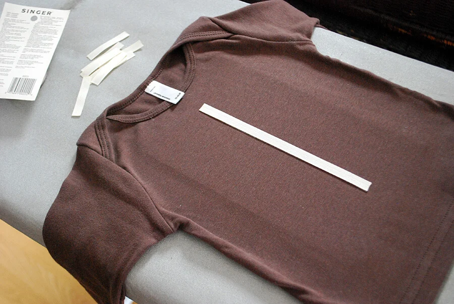 Make a DIY football t-shirt for the Super Bowl using iron-on web and grosgrain ribbon - no sewing required