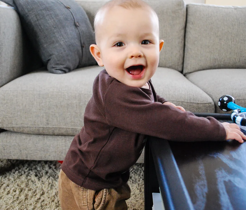 Happy baby in a handmade football t-shirt