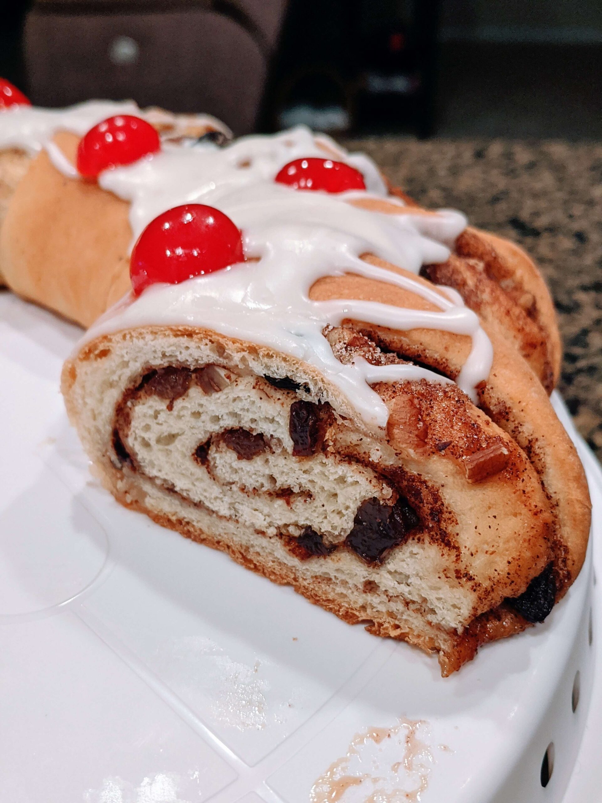 Cinnamon roll wreath for Christmas breakfast cut into slices