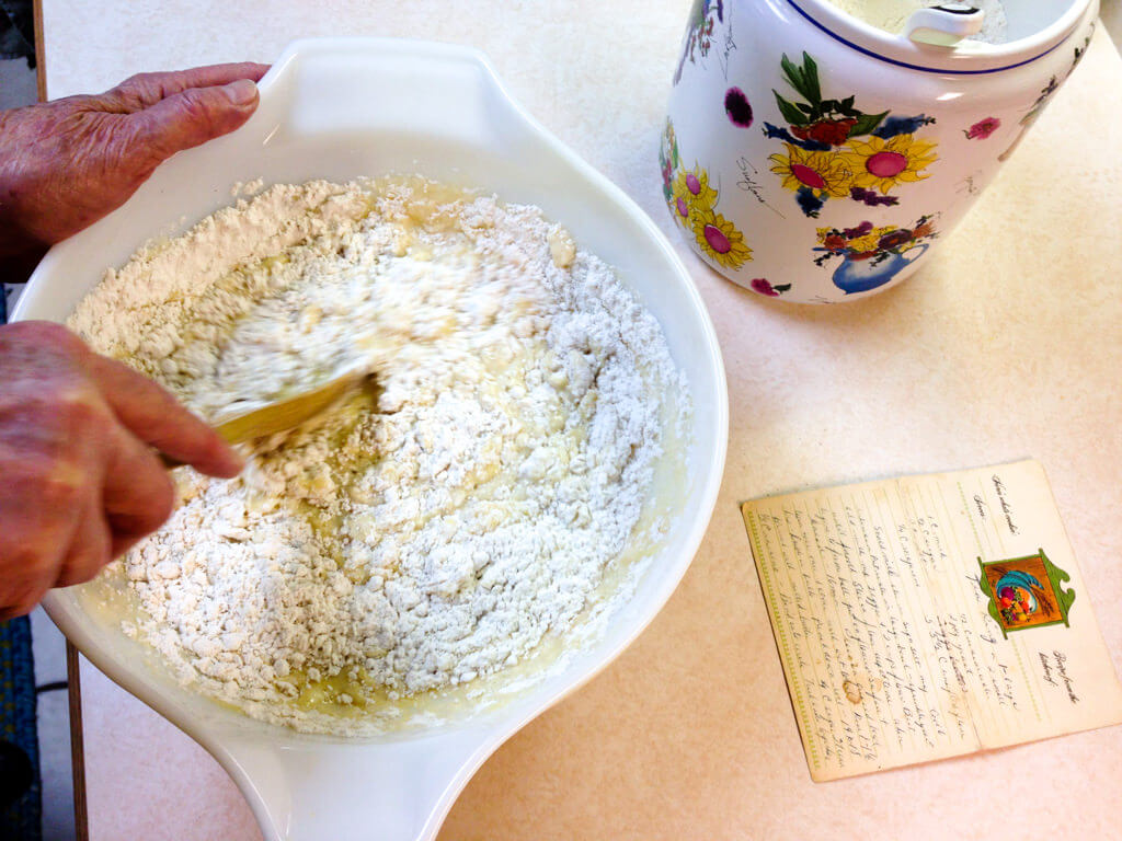 Mixing flour for a Swedish Tea Ring in a bowl