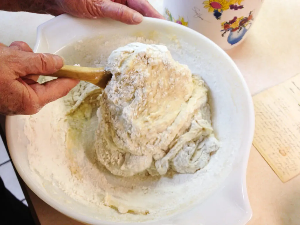 Mixing flour for a Swedish Tea Ring in a bowl