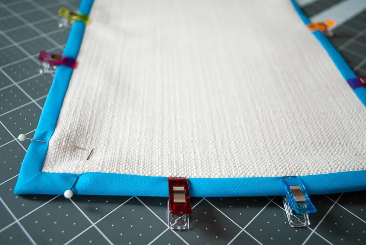 Pinning bias tape onto fabric