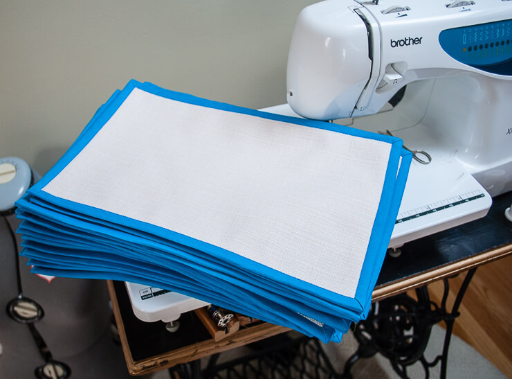 Stack of place mats sewn with bias tape