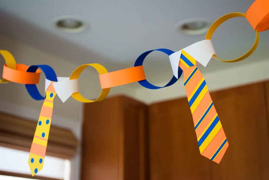 Easy DIY Tie Garland for Father's Day - such a cute decoration for kids to make for Daddy! #colorize #ad