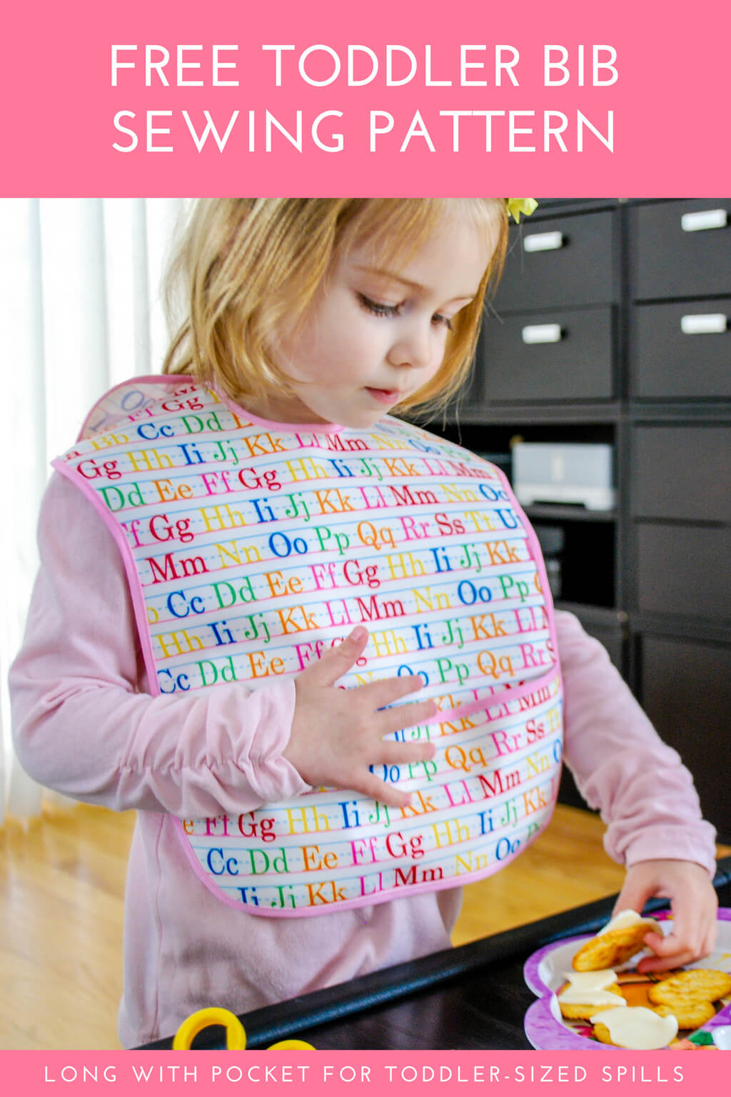 Extra-long baby bib free sewing pattern - long bib with large pocket for toddlers
