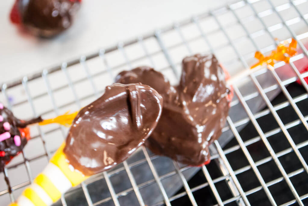 Making chocolate strawberry hearts