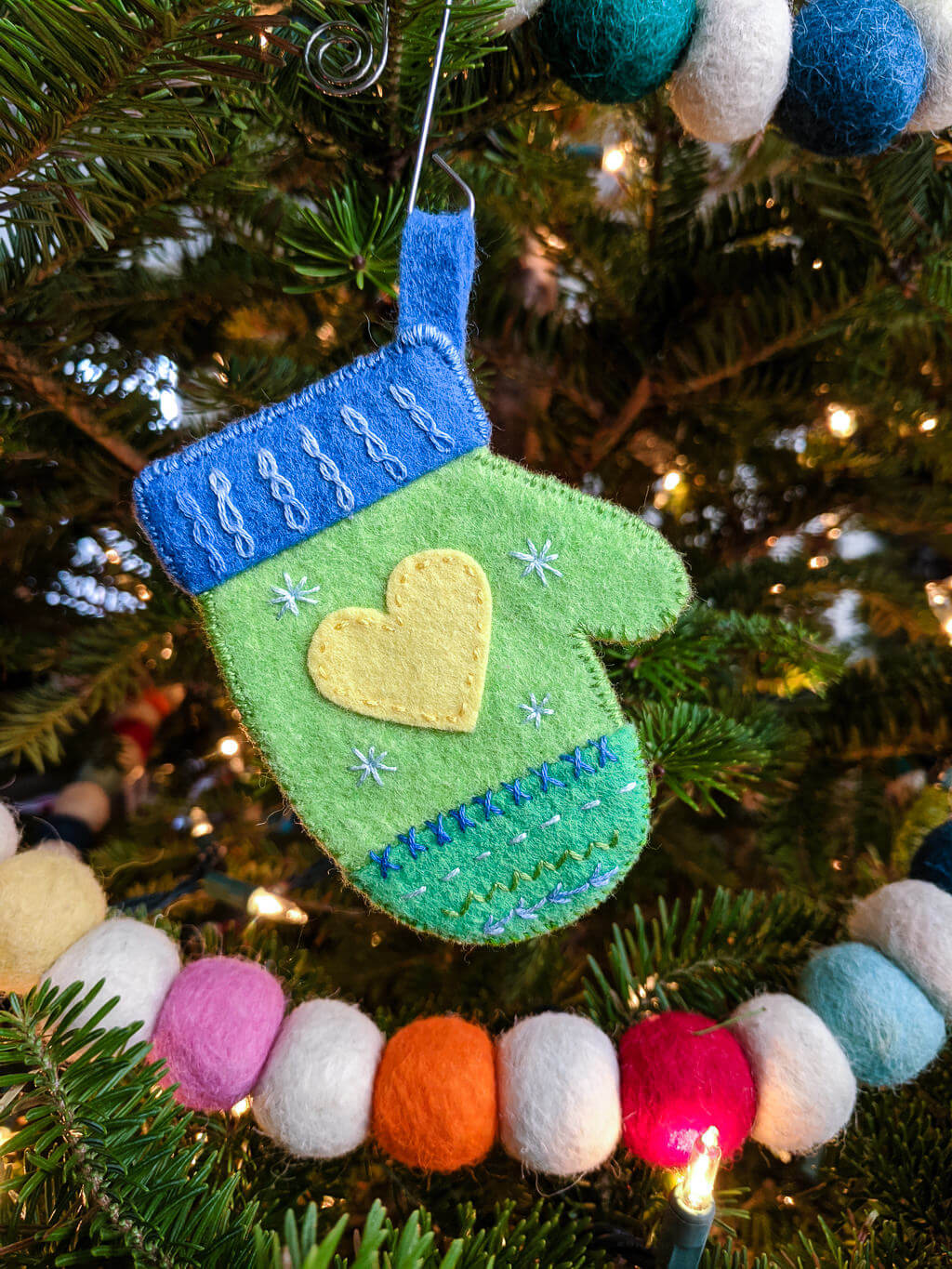 DIY mitten ornament on a Christmas tree