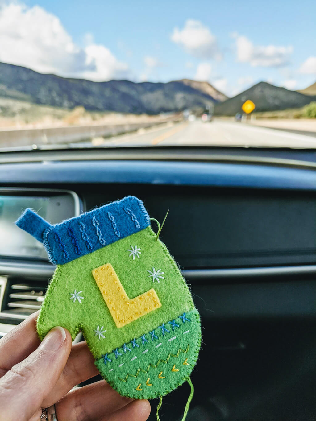 Making felt mitten Christmas ornaments on a desert roadtrip